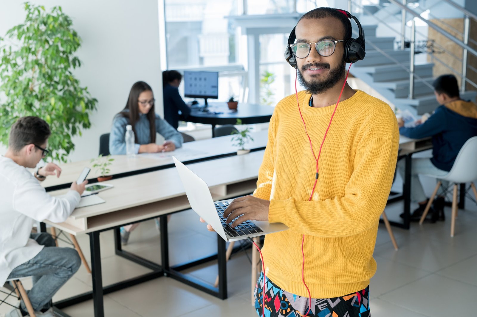 Male designer using laptop